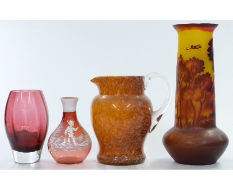 Four glass three glass vases comprising a Galle style cameo glass vases with red decoration of trees over a yellow ground, Ma