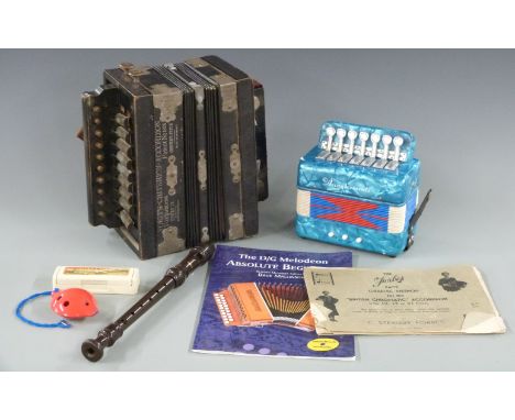 Voights Criterion German two stop accordion / melodeon, c1910, together with a child's melodeon with seven treble and three b