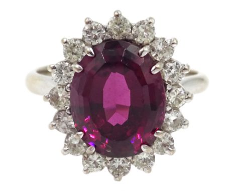 18ct white gold rubellite tourmaline and diamond cluster ring, stamped 18ct Condition Report Approx 5.8gm, size P. overall he