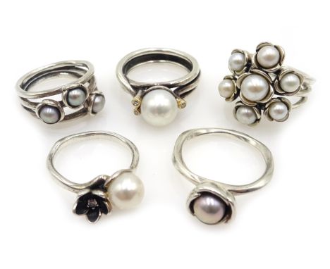 Pandora silver pearl and diamond ring and four other Pandora silver pearl set rings, all stamped 925 ALE (5)