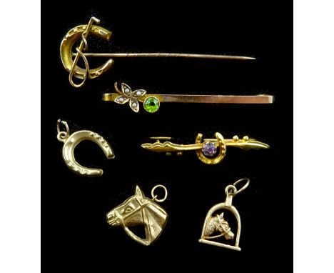 Two Edwardian gold stone set brooches, two charms and a horse shoe stick pin all stamped 9ct and one other 9ct gold (tested) 