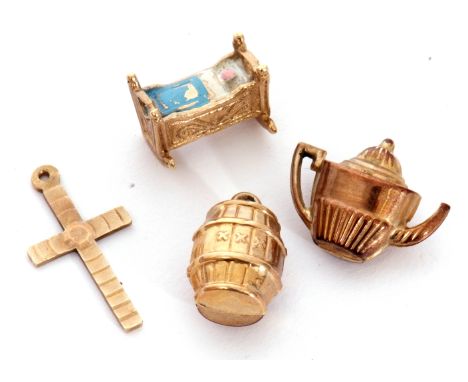 Mixed Lot: four 9ct gold charm/pendants to include unusual enamel and gold model of a baby in a crib, beer barrel, coffee pot