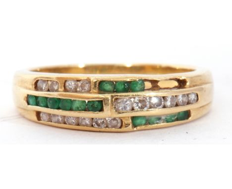 Emerald and diamond set half hoop ring, an Art Deco design of three bands of channel set diamonds and three bands of emeralds