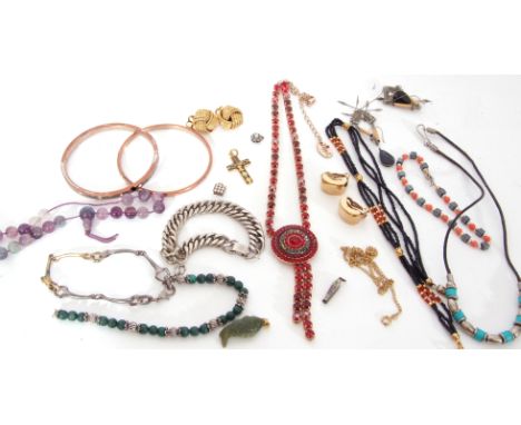 Mixed Lot: two metal bangles, a modern carved jade fish pendant, necklaces, earrings etc