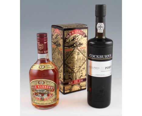1 bottle of Old Harbour 12 year old Scotch Whisky. 40% 70cl. 1 bottle of Cockburns Assured Exclusive Edition Port. 20% 75cl.
