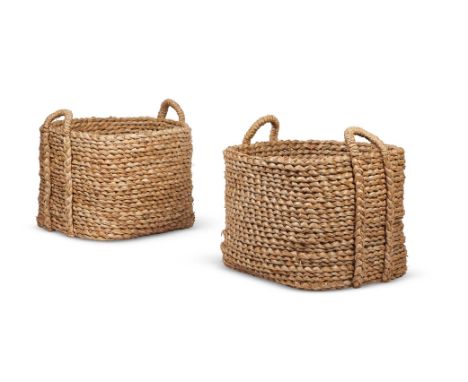 
	
		A PAIR OF WOVEN RUSH LOG BASKETS
		MODERN
		With twin handles above the square bodies
		70cm high, approximately 67cm sq