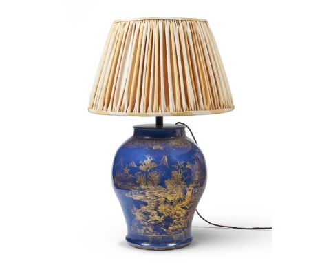 
	
		A CHINESE POWDER BLUE BALUSTER VASE,
		18TH CENTURY, 
		decorated with buildings and trees in gilt chinoiserie,
		adapte