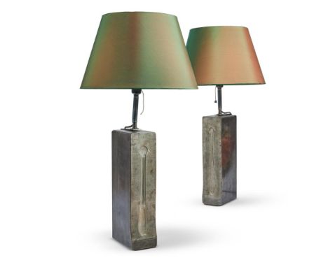 
	
		TWO SIMILAR CAST METAL LAMP BASES
		FRENCH 1930s 
		Adapted from moulds for casting spoon and ladle handles, impressed w