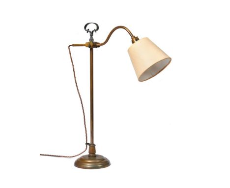 
	
		A BRASS ADJUSTABLE TABLE LAMP WITH CARRYING HANDLE
		55cm high
		&nbsp;
		Provenance: 
		Supplied by Christopher Gibbs
	
