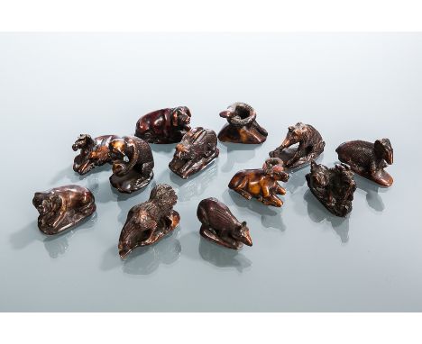 LATE 20TH CENTURY CHINESE WALL DECORATION 
set with simulated jade panels; along with a group of twelve Chinese animals (13) 