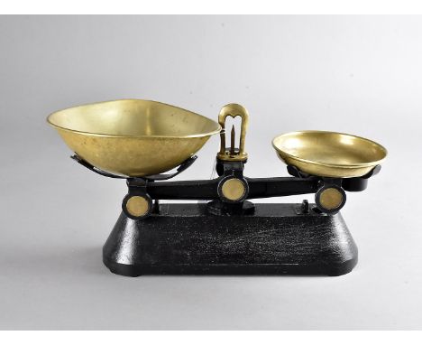 A set of Slaters Improved family scales, together with three sets of balance scales with weights and a preserve pan 