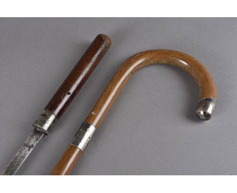 A 19th century sword stick, the malacca cane with white metal collar bearing the name Edwin Richardson 1875 pulls out to reve