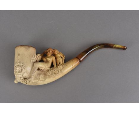 A 19th century Meerschaum pipe, modelled as Venus and Cupid, in original black leather case, 22 cm long max 