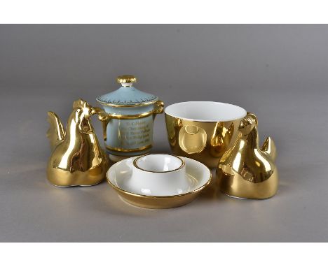 A pair of Royal Worcester gold lustre cup and saucers, together with a matching pair of egg cups and covers, and a royal comm