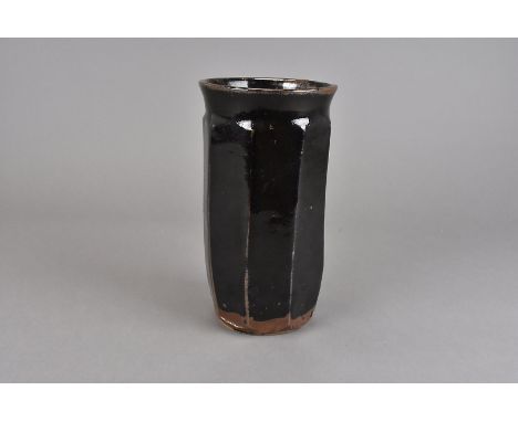 Shoji Hamada (1894-1978), a cut sided, or slab sided, vase in treacle glaze, 23.5 cm high Bought at the Hamada/Leach exhibiti