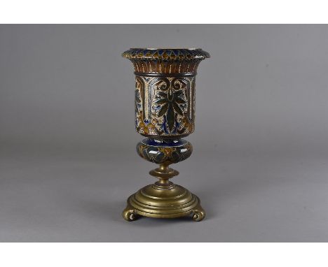 An Edith Lupton for Doulton paraffin lamp stand, on brass base with Hinks cast iron counterweight, marked to the inside rim 3