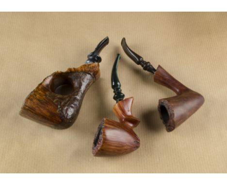 Three American briar pipes, comprising a novel Tim West rustic and part polished large bowl with thumb hole, also a Swink fre