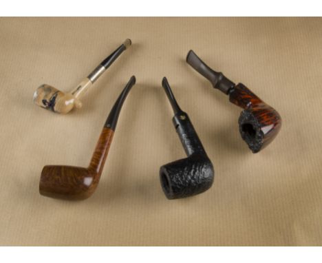 A collection of European estate pipes, comprising an Amphora sandblasted with stamped reg no. and shank marked 417310 with ad