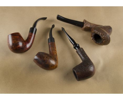 A Carey Magic Inch briar estate pipe, free hand sitter with sandblast finish, made in Denmark, having a filter stem, a Svendb