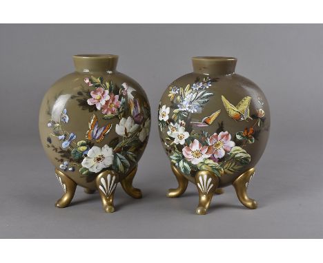 A pair of Victorian glass moon flasks, the flattened ovoid bodies supported on four gilt bracket feet each bearing enamelled 
