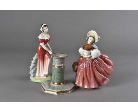 A Royal Doulton figurine 'The Skater' HN 2117, c. 1952, together with Jemma HN 3168, and a Royal Doulton crackle glaze candle