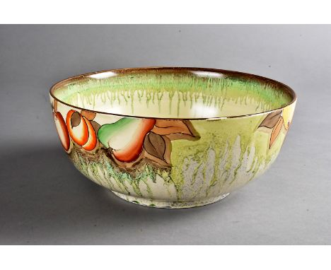 A Clarice Cliff for Wilkinson Ltd. fruit bowl, decorated with apples, pears, and citrus fruit 9 cm H x 22 cm dia.Several ligh