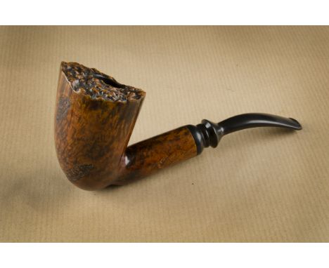 A Fischer Buffalo free hand carved briar estate pipe, the large smooth bowl and shank, with carved panels, hand cut stem in g