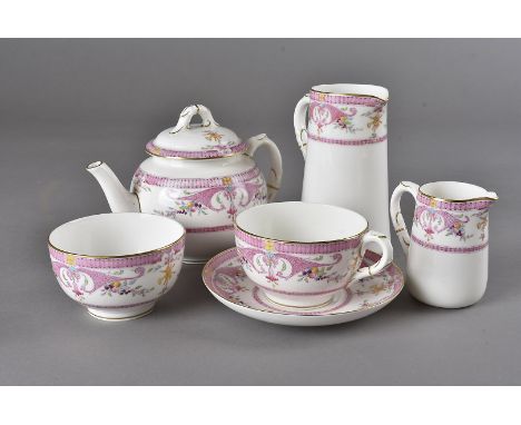 A Royal Worcester 'Bordeaux' pattern tête-à-tête tea set, decorated mainly in pink, dated 1929, comprising tea pot, milk jug,