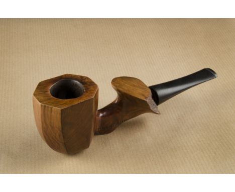 An R.L.Lafond briar estate pipe, the free hand carved sitter, with octagonal bowl, plastic stamped shaped stem  