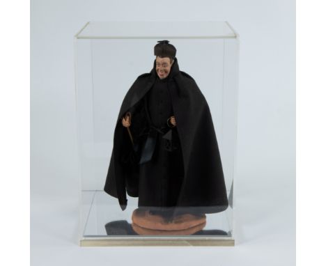 Figurine of Don Camillo in plexi boxBeeld van Don Camillo in plexi box31 x 23 x 20 cm