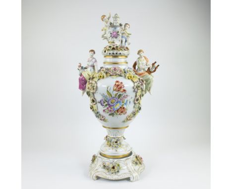 Exceptionally large porcelain decorative vase with finely elaborate decor of floral garlands and figures with hand-painted fl