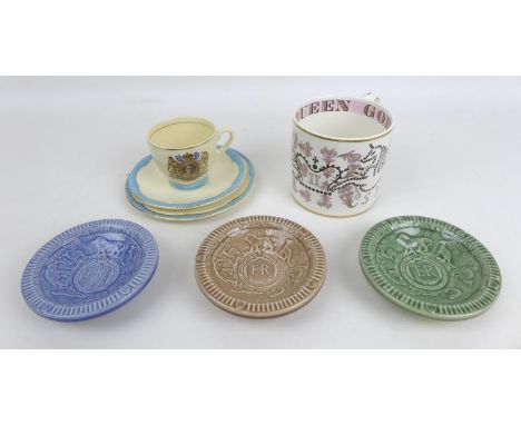 A Clarice Cliff ERII coronation trio, with cup saucer and tea plate, together with other ERII coronation commemorative wares,