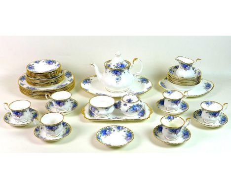 A Royal Albert part tea and dinner service, decorated in the Moonlight Rose pattern, comprising teapot, 20cm high, milk jug, 