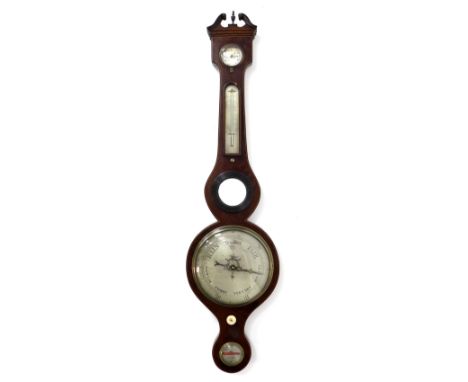 A Victorian mahogany wheel barometer, with boxwood and ebony strung inlays, silvered dial, with level below, small convex mir
