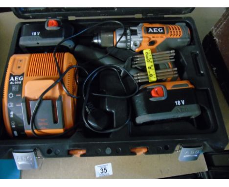 AEG DRILL WITH TOOLS