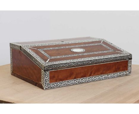 A sandalwood and ivory inlaid writing slope,early 19th century, Anglo-Indian, Vizagapatam, the ivory borders with continuous 
