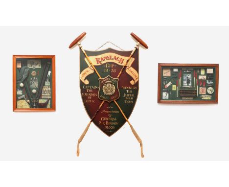 A selection of sporting memorabilia,comprising: a painted shield for the 'Ranelagh Open Challenge Cup, 1938', a golfing displ