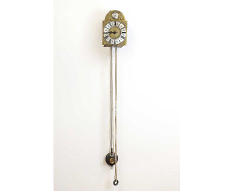 A brass lantern clock,early 18th century, the seven-inch arched dial with single hand and inscribed 'Joseph Hawkeens Kelvedon