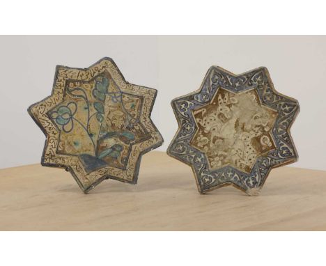 A star-shaped lustre-glazed tile,Kashan, the central field decorated with deer, within a blue and white border,20.5cm diamete
