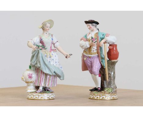 A pair Meissen porcelain figures of gardeners, late 19th century, each decorated in polychrome and dressed in 18th-century co