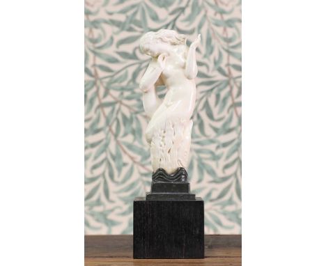 *Richard Louis Garbe RA (1876-1957),a mermaid, carved ivory on an ebony base, signed and dated 1935,26.5cm high*Artist's Resa