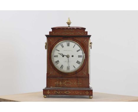 A Regency mahogany bracket clock,last quarter of the 18th century, the brass inlaid case with pineapple finial, the white-pai