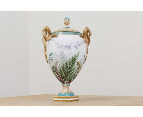 A Royal Worcester potpourri vase and cover,the pierced cover on an ovoid-shaped body painted with ferns and flowers, within t