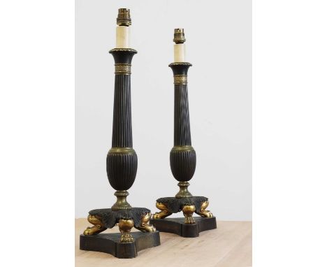 A pair of Empire-style gilt and patinated bronze table lamps,late 19th/early 20th century, French, each fluted column raised 