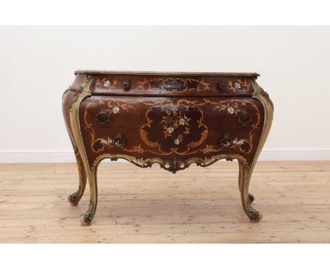 A walnut and parquetry-inlaid commode,20th century, Italian, of serpentine bombé form, with three graduated long drawers, eac