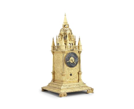 A first half of the 17th century German gilt brass table clockPossibly Nicholas Schmidt.  Surmounted by an obelisk raised on 