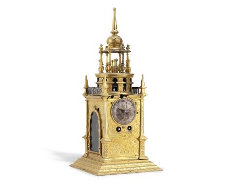 A rare first half of the 17th century German gilt engraved brass table clock or 'Tischuhr'The architectural case surmounted b