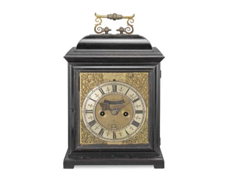 A rare early 18th century ebony table clockCharles Goode, LondonSurmounted by a bold 'Quare-style' double-S scroll handle   o