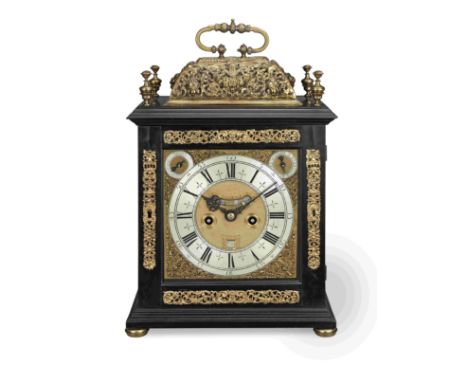 A late 17th century ebony basket top table clock with twin subsidiaries Signed behind the mock pendulum apertureWilliam Webst