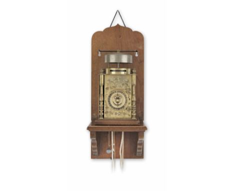 A rare 19th century Japanese weight driven wall clock with alarm, now in a later hooded caseThe clock body surmounted by a st